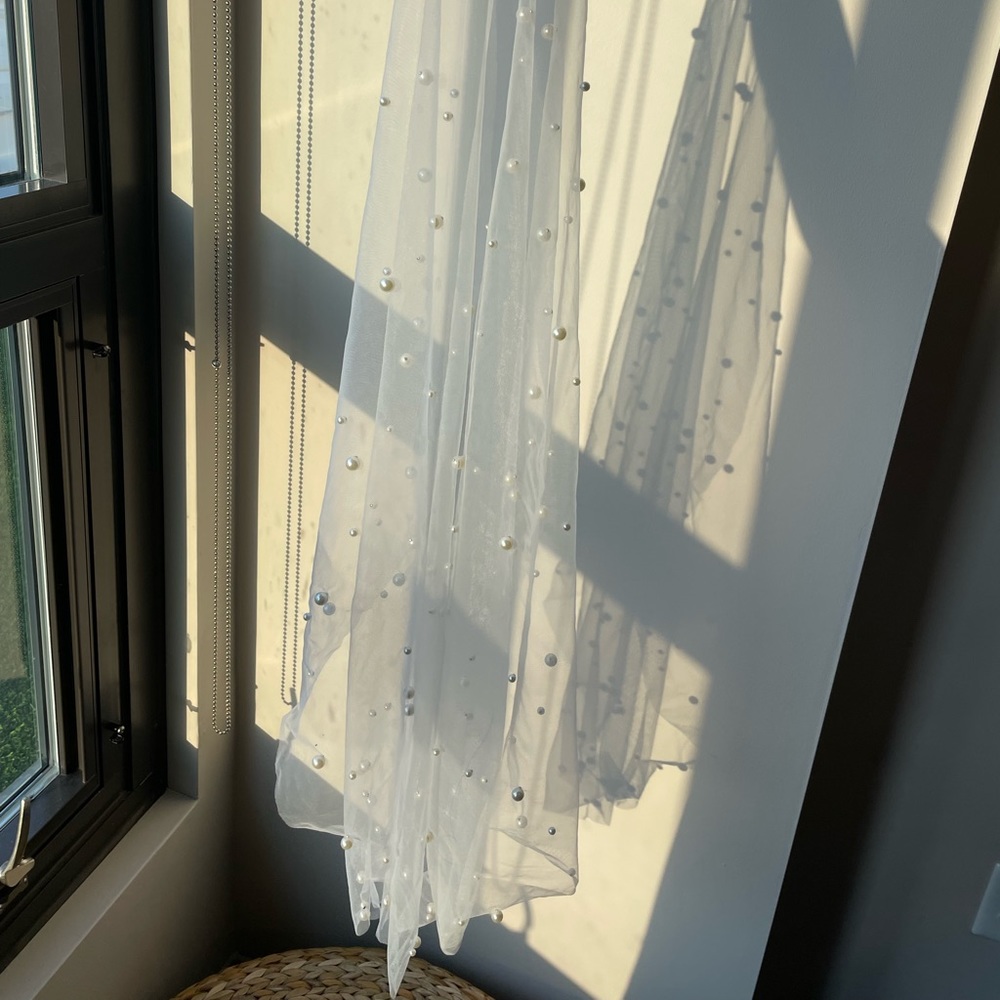 Pearl white fingertip wedding veil with comb